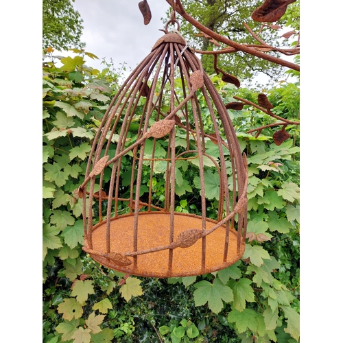 160 - Decorative wrought iron bird feeder in the form of a tree and two hanging bird cages {224 cm H x 135... 