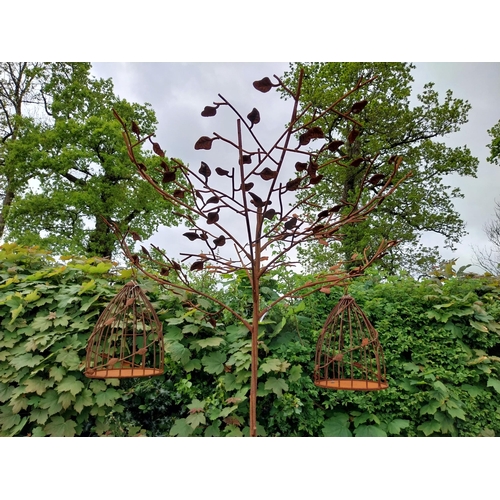 160 - Decorative wrought iron bird feeder in the form of a tree and two hanging bird cages {224 cm H x 135... 