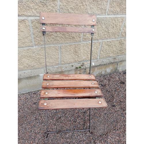 163 - Cast iron table marble top with two folding metal and wooden bistro chairs {Table H 70cm x W 106cm x... 