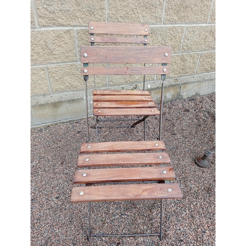 163 - Cast iron table marble top with two folding metal and wooden bistro chairs {Table H 70cm x W 106cm x... 