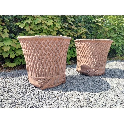 174 - Pair of moulded terracotta circular lattice urns {53 cm H x 54 cm Dia.}.