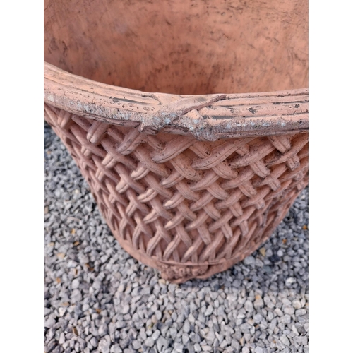 174 - Pair of moulded terracotta circular lattice urns {53 cm H x 54 cm Dia.}.