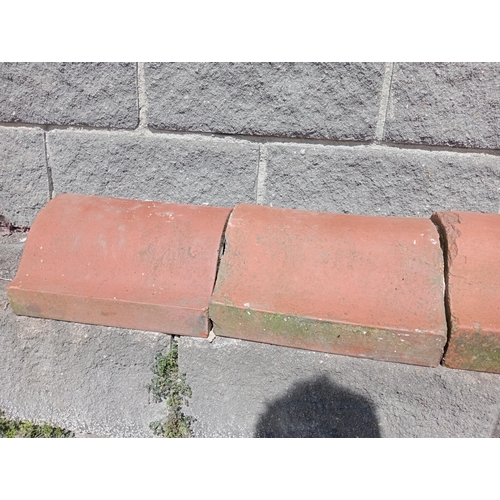 185 - Collection of twenty terracotta wall copings {H 16cm x W 30cm x D 31cm }. (NOT AVAILABLE TO VIEW IN ... 