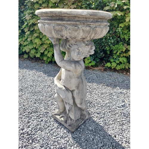 194 - Moulded stone bird bath held of loft by Cherub {91 cm H x 49 cm Dia.}.