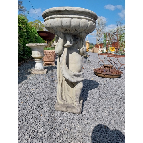 194 - Moulded stone bird bath held of loft by Cherub {91 cm H x 49 cm Dia.}.