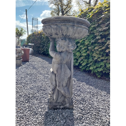 194 - Moulded stone bird bath held of loft by Cherub {91 cm H x 49 cm Dia.}.