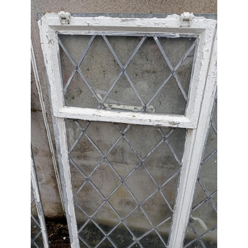 198 - Pair of cast iron leaded glass windows {Each H 90cm x W 48cm }. (NOT AVAILABLE TO VIEW IN PERSON)