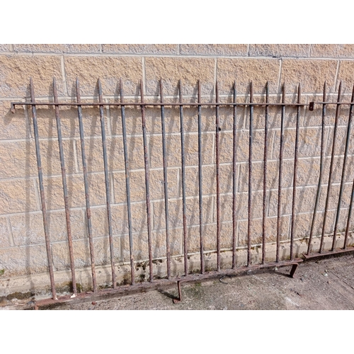 199 - Forged iron gate railings with pointed finials {H 150cm x W 18 metres }.