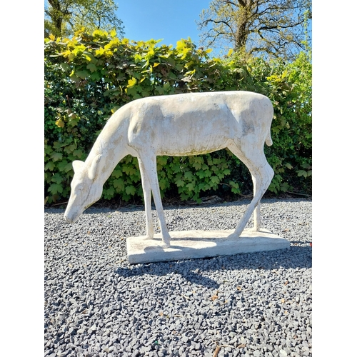 204 - Moulded stone statue of a Deer {88 cm H x 122 cm W x 77 cm D}.