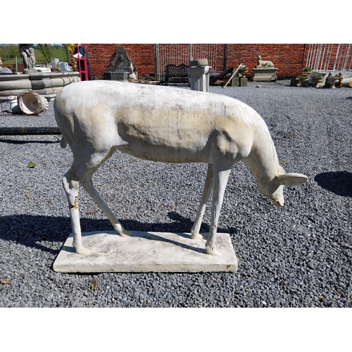 204 - Moulded stone statue of a Deer {88 cm H x 122 cm W x 77 cm D}.