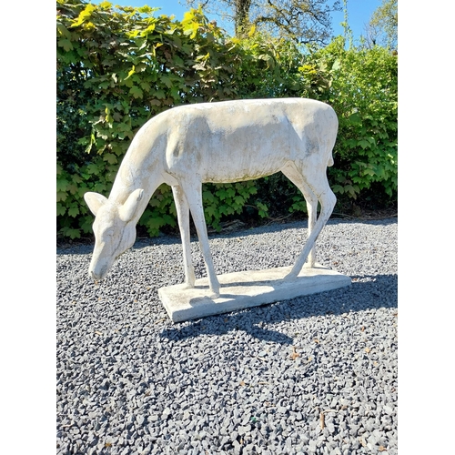 204 - Moulded stone statue of a Deer {88 cm H x 122 cm W x 77 cm D}.