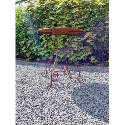 205 - Wrought iron caf� - garden circular table with two matching chairs {Tbl. 75 cm H x 70 cm Dia. Chairs... 