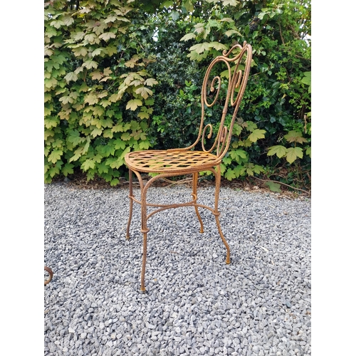 205 - Wrought iron caf� - garden circular table with two matching chairs {Tbl. 75 cm H x 70 cm Dia. Chairs... 