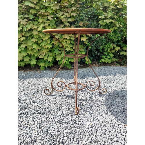 205 - Wrought iron caf� - garden circular table with two matching chairs {Tbl. 75 cm H x 70 cm Dia. Chairs... 