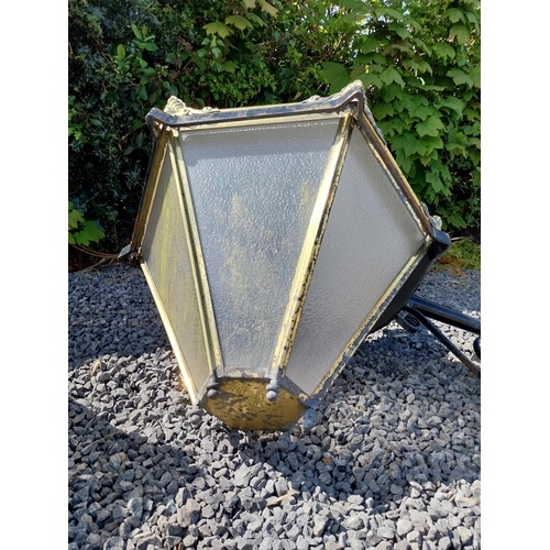 214 - Pair of brass wall lanterns with wrought iron brackets {79 cm H x 83 cm W x 60 cm D}.