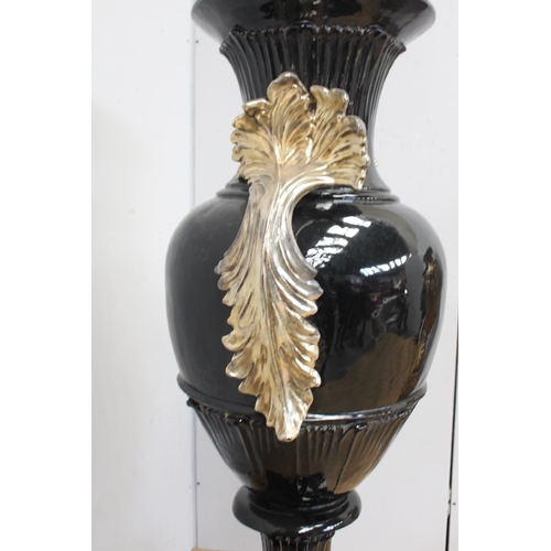 215 - Ornate gold and black Italian hand painted urn raised on base decorated with Acanthus leaves{H 180cm... 