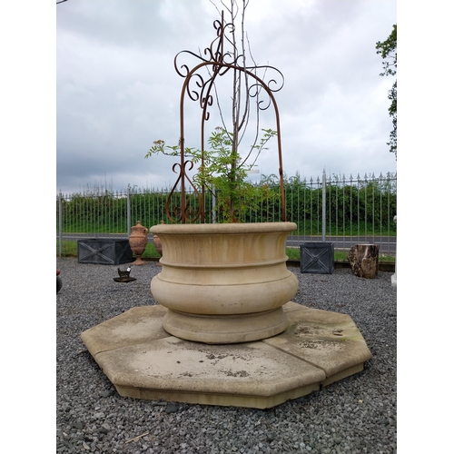 216 - Good quality moulded sandstone well head with platform base and wrought iron arch {224 cm H x 180 cm... 