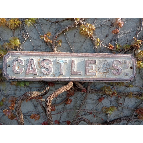 231 - Cast iron Street sign Castle St {H 17cm x W 82cm }.