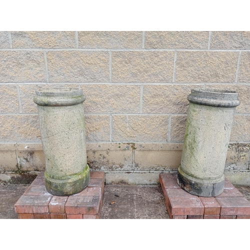 233 - Pair of round chimney pots {H 68cm x D 32cm}. (NOT AVAILABLE TO VIEW IN PERSON)