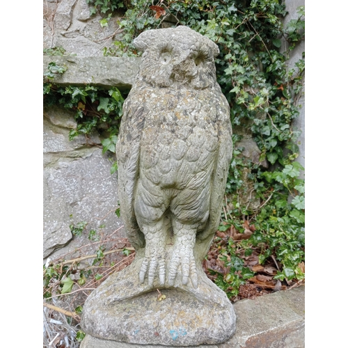 237 - Composition stone statue of a barn owl {H 46cm x W 23cm x D 12cm }. (NOT AVAILABLE TO VIEW IN PERSON... 