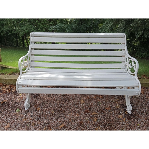 257 - Cast iron and wooden rolltop bench {H 87cm x W 134cm x D 75cm }.