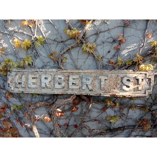 261 - Cast iron Street sign Herbert St {H 18cm x W 101cm}. (NOT AVAILABLE TO VIEW IN PERSON)