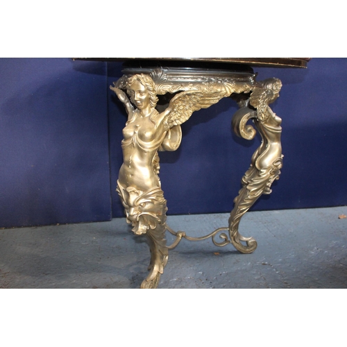 27 - Bronze circular garden table with marble round top raised on three decorative Angel legs  {H 84cm x ... 