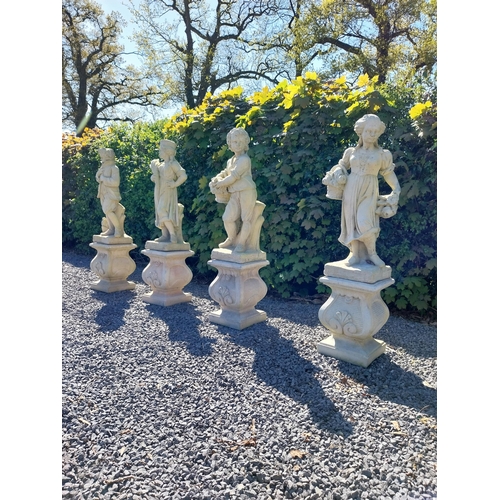 272 - Moulded sandstone Four Seasons statues raised on pedestals {119 cm H x 28 cm W x 28 cm D}.