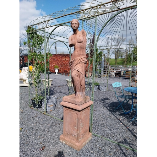 274 - Moulded terracotta Venus de Milo statue raised on pedestal {200 cm H x 47 cm W x 47 cm D}.