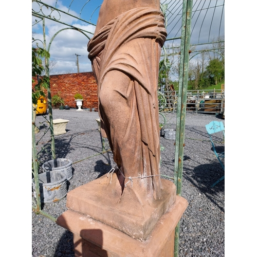 274 - Moulded terracotta Venus de Milo statue raised on pedestal {200 cm H x 47 cm W x 47 cm D}.