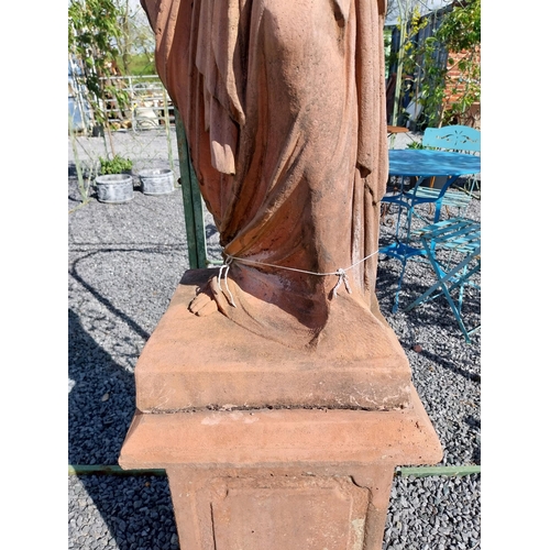 274 - Moulded terracotta Venus de Milo statue raised on pedestal {200 cm H x 47 cm W x 47 cm D}.