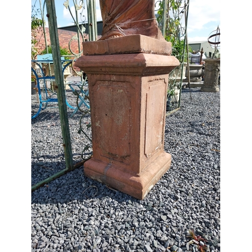 274 - Moulded terracotta Venus de Milo statue raised on pedestal {200 cm H x 47 cm W x 47 cm D}.