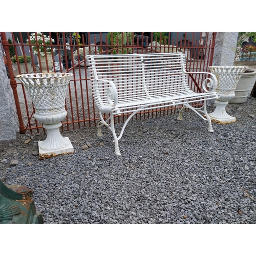 276 - Pair of good quality cast iron urns with lattice design {63 cm H x 43 cm Dia.}.