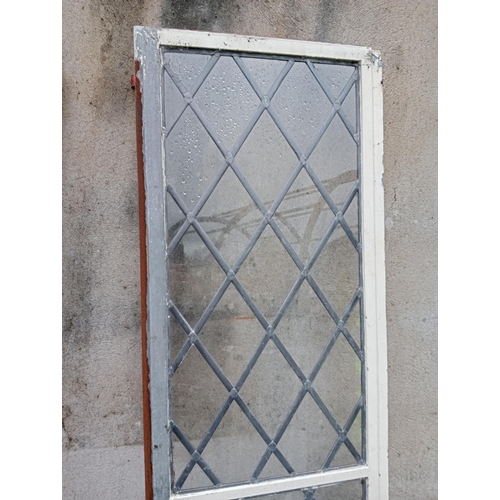 277A - Pair of tall cast iron leaded windows {Each H 202cm x W 48cm }. (NOT AVAILABLE TO VIEW IN PERSON)