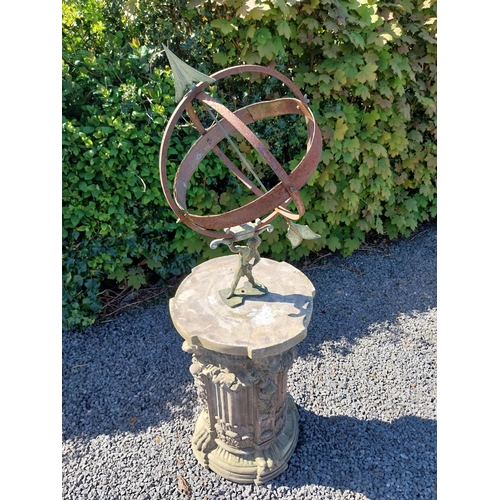 292 - Copper and metal Armorial sundial raised on composition pedestal decorated with lions masks and paws... 