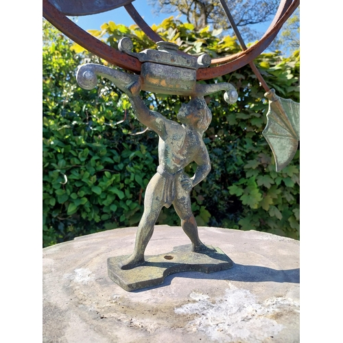 292 - Copper and metal Armorial sundial raised on composition pedestal decorated with lions masks and paws... 