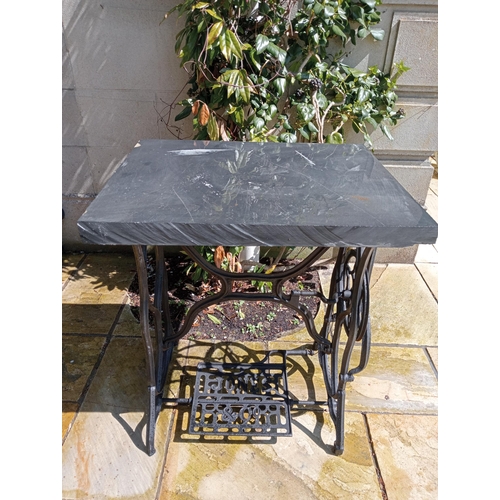 297 - Cast iron sewing base with slate top {H 77cm x W 66cm x D 54cm}. (NOT AVAILABLE TO VIEW IN PERSON)