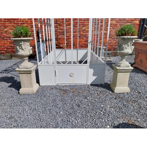 300 - Pair of good quality moulded sandstone Grecian urns raised on pedestals {110 cm H x 68 cm Dia.}.