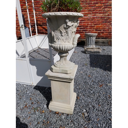 300 - Pair of good quality moulded sandstone Grecian urns raised on pedestals {110 cm H x 68 cm Dia.}.