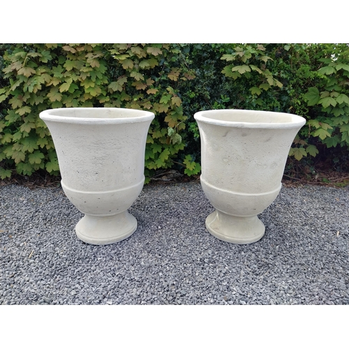 334 - Pair of moulded sandstone circular urns {74 cm H x 59 cm Dia.}.