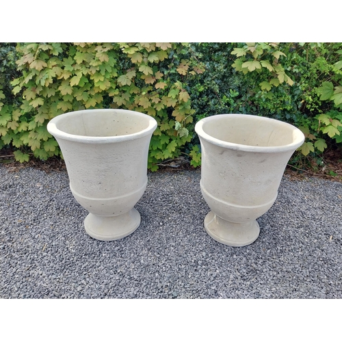 334 - Pair of moulded sandstone circular urns {74 cm H x 59 cm Dia.}.