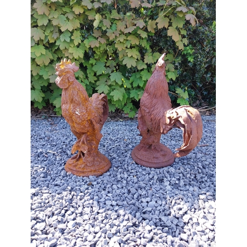 342 - Pair of cast iron statues of Roosters {43 cm H x 36 cm W x 20 cm D}.