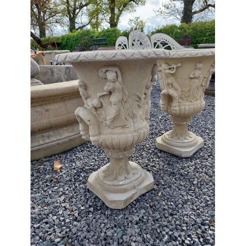 346 - Pair of good quality moulded sandstone Grecian urns {57 cm H x 39 cm Dia.}.