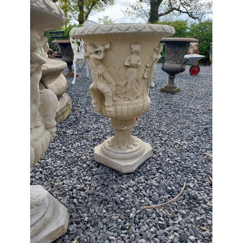 346 - Pair of good quality moulded sandstone Grecian urns {57 cm H x 39 cm Dia.}.