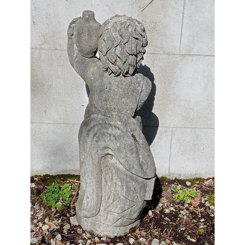 351 - Stone statue of a Boy holding jug {H 82cm x W 35cm x D 25cm }. (NOT AVAILABLE TO VIEW IN PERSON)