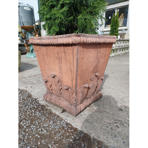 358 - Pair of moulded terracotta urns decorated with acanthus leaf {62 cm H x 58 cm W x 58 cm D}.