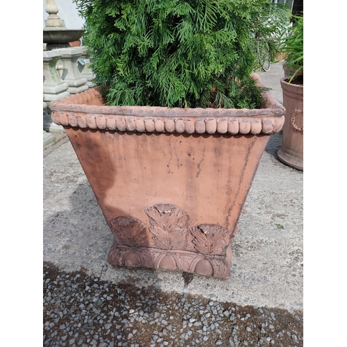 358 - Pair of moulded terracotta urns decorated with acanthus leaf {62 cm H x 58 cm W x 58 cm D}.