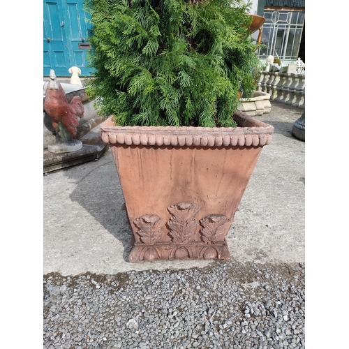 358 - Pair of moulded terracotta urns decorated with acanthus leaf {62 cm H x 58 cm W x 58 cm D}.