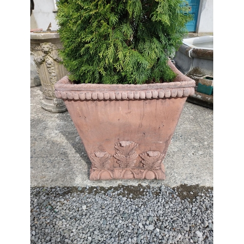 359 - Pair of moulded terracotta urns decorated with acanthus leaf {62 cm H x 58 cm W x 58 cm D}.