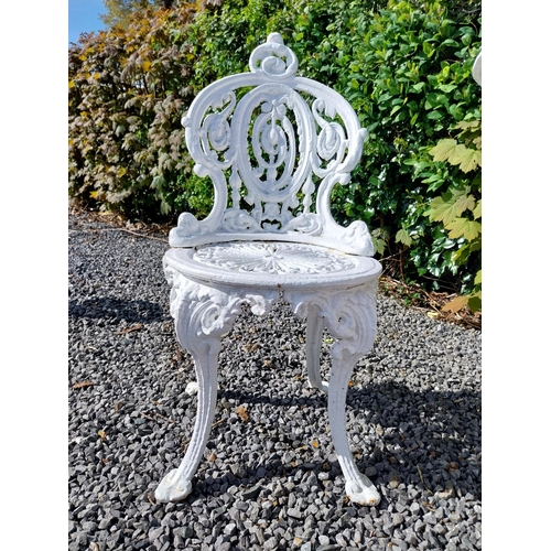 36 - 19th C. cast iron garden table with three matching chairs {Tbl. 68 cm H x 59 cm Dia. and Chairs 83 c... 